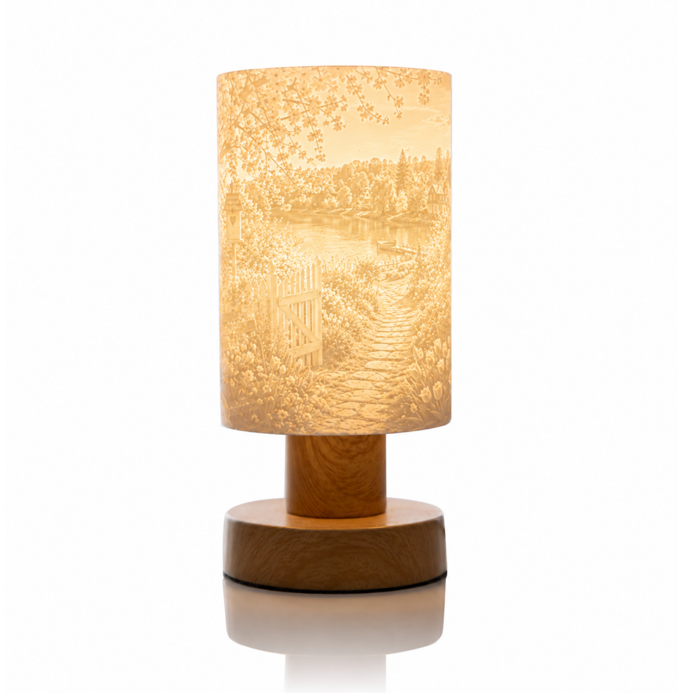 Eingeschaltete Litholoom Soft Loom Tischlampe mit beleuchtetem Frühlingsmotiv und angenehmer Lichtwirkung.